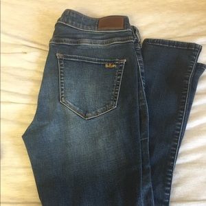 High-rise super skinny blue Hollister jeans.